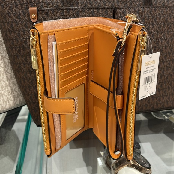MICHAEL KORS JST LG DOUBLE ZIP WRISTLET WALLET PHONE HOLDER 
Cider Multi 
NWT - Picture 7 of 16